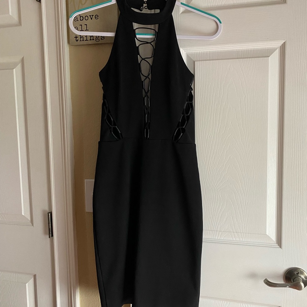 Bebe black halter neck cocktail dress. Worn once, excellent condition. Lined.